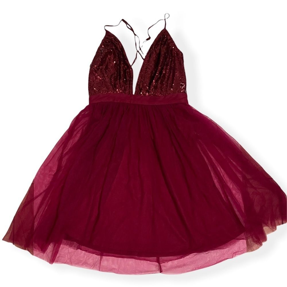Party dress- Beautiful for a night out.  Wine red colour.